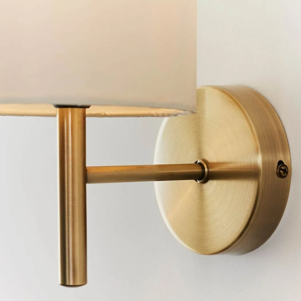 Brio Antique Brass Wall Light with Cream Shade